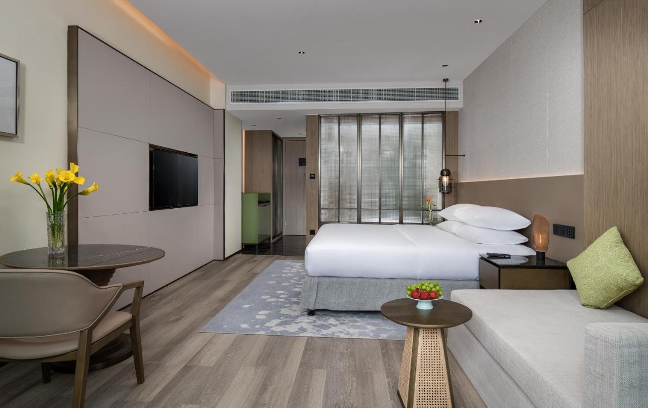 Golden Shining New Century Grand Hotel Бэйхай Экстерьер фото