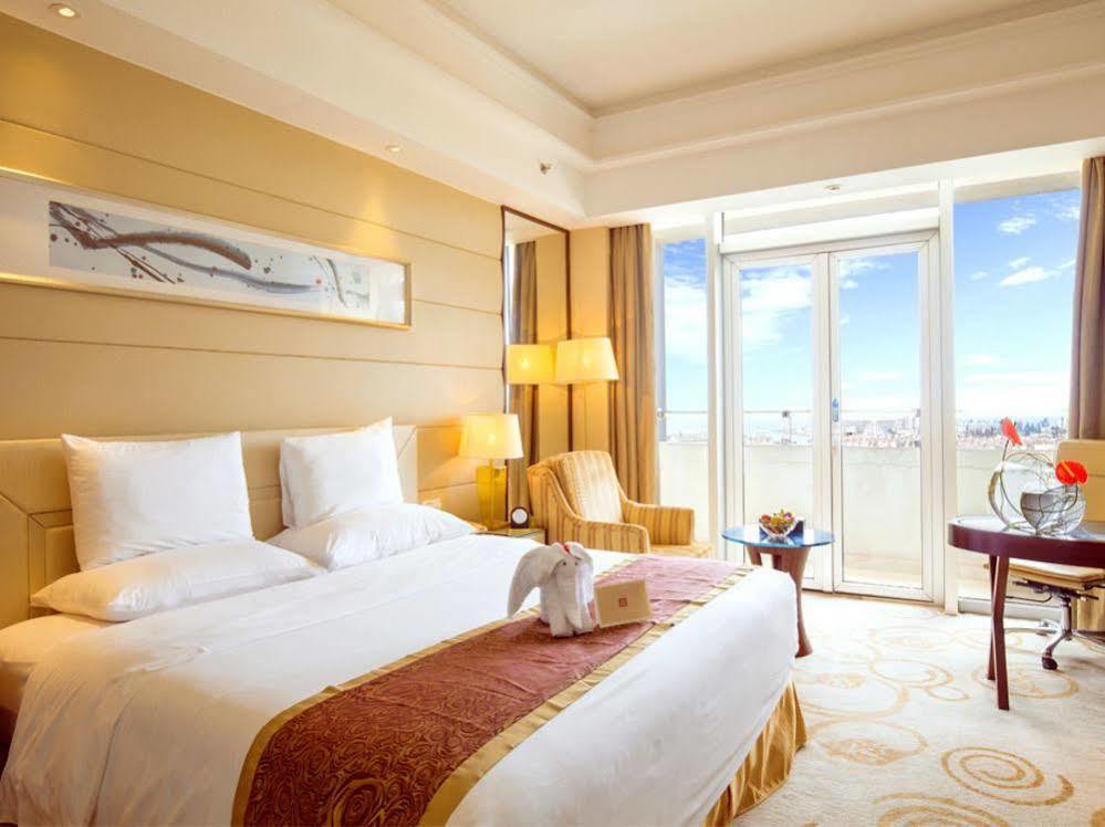 Golden Shining New Century Grand Hotel Бэйхай Экстерьер фото